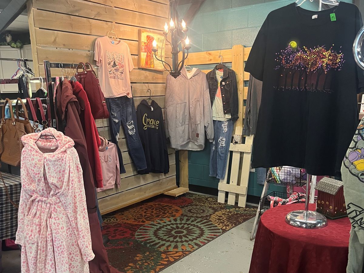 Clothing and household items on display at the Servolution Thrift Store